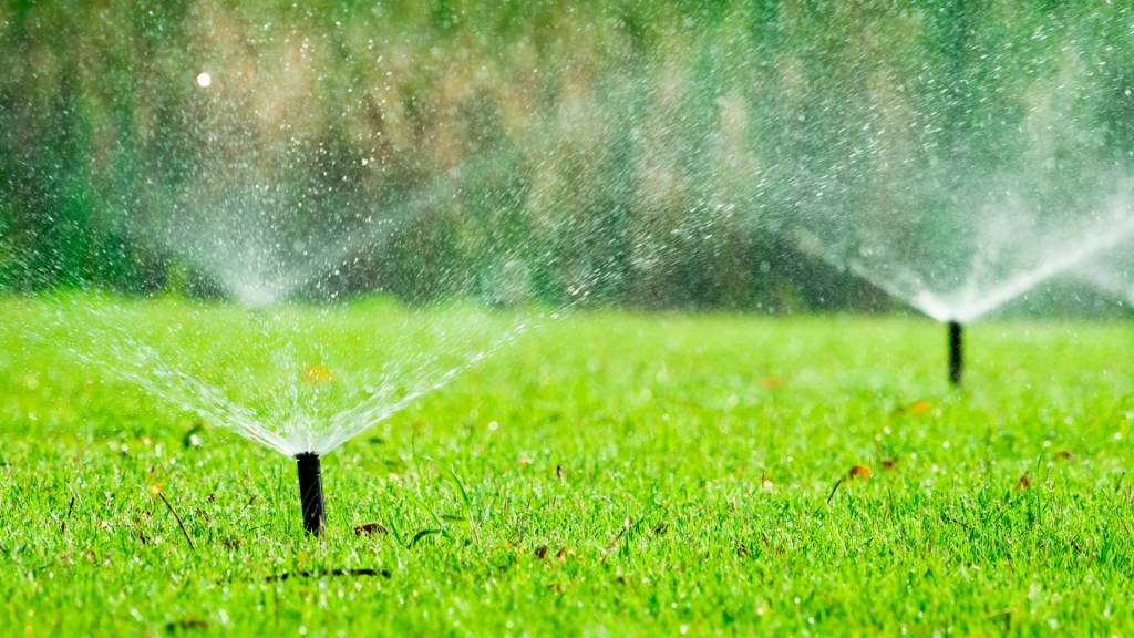 Sprinklers running on irrigation system in Western NC yard